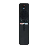 This image features a sleek black smart TV remote with voice control, navigation buttons, and dedicated Netflix and Prime Video shortcuts for easy streaming access.